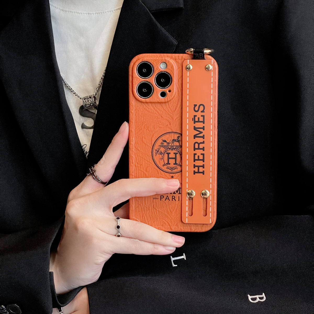 H iPhone-hoesje met polsbandje