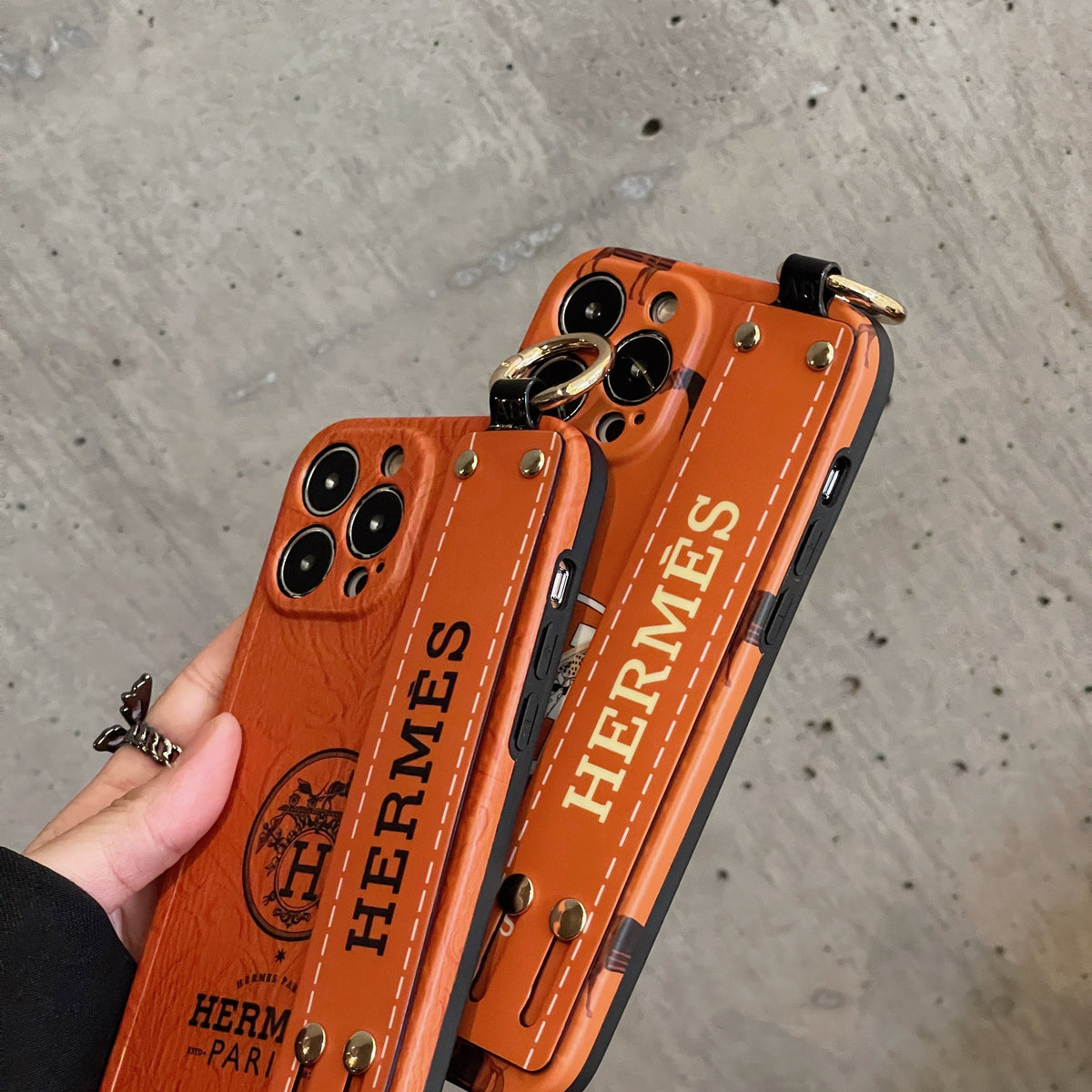 H iPhone-hoesje met polsbandje