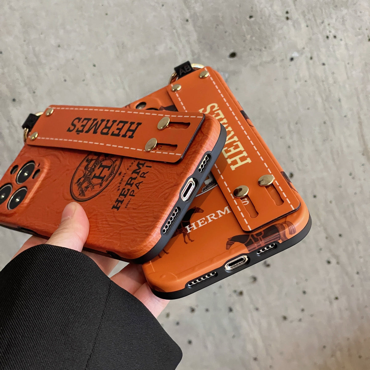 H iPhone-hoesje met polsbandje