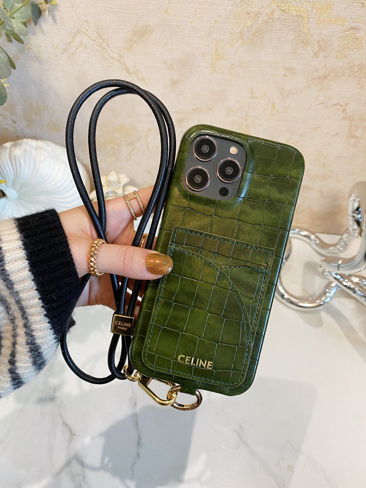 Celine iPhone-hoesje met alligatorprint, kaarthouder en riem, groen -EYP241415