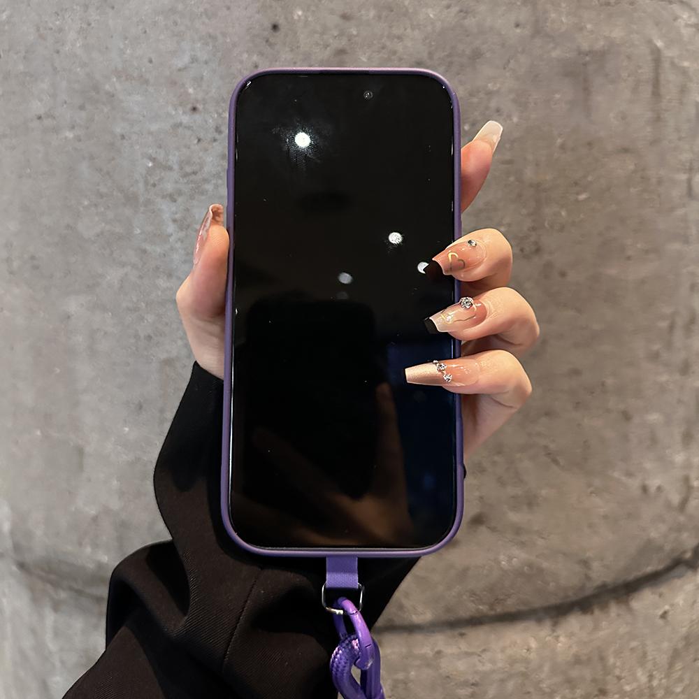 Funda de lujo para iPhone con estampado en relieve y correa para la muñeca desmontable